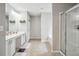 Spacious bathroom boasts a double sink vanity, separate shower, and soaking tub at 9744 Musket Ridge Cir, Jonesboro, GA 30238