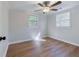Bright bedroom with hardwood floors, neutral paint, a ceiling fan, and natural light at 1786 Richard Ne Rd, Conyers, GA 30012