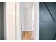 Well-lit hallway with doors leading to various rooms in the home at 1786 Richard Ne Rd, Conyers, GA 30012