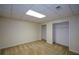 A carpeted bedroom is shown with two closets and neutral-colored walls and trim at 2002 Fairbrook Ln, Woodstock, GA 30189