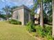 This home is shown with an upper and lower deck, and a large front and side yard at 2002 Fairbrook Ln, Woodstock, GA 30189