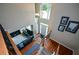 Spacious foyer with hardwood floors and view of the living room at 2002 Fairbrook Ln, Woodstock, GA 30189