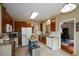 Spacious kitchen with stainless steel appliances, granite countertops, and ample cabinet space at 2002 Fairbrook Ln, Woodstock, GA 30189