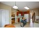 Well-lit kitchen with updated appliances, granite countertops, and a view of the staircase at 2002 Fairbrook Ln, Woodstock, GA 30189