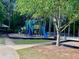 Community playground with slides, climbing structures, and a shaded gazebo at 2002 Fairbrook Ln, Woodstock, GA 30189