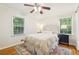 Cozy bedroom with natural light, hardwood floors, and tasteful decor at 2381 Woodacres Ne Rd, Atlanta, GA 30345