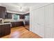 Modern kitchen features dark wood cabinets, stainless steel appliances, and ample storage space at 2381 Woodacres Ne Rd, Atlanta, GA 30345