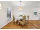 Bright dining room featuring hardwood floors and a view to the back yard at 2381 Woodacres Rd, Atlanta, GA 30345