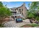 Expansive backyard with spa, stone patio, deck, fire pit and lush, mature trees providing shade at 3106 Soldier Trl, Marietta, GA 30068