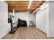 Bright basement features exposed ductwork and framing and wood-look flooring at 3106 Soldier Trl, Marietta, GA 30068