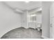 Unfinished basement bathroom with gray tile, white cabinetry and modern fixtures at 3106 Soldier Trl, Marietta, GA 30068