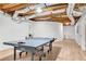 Finished basement with wood-look flooring and ping pong table for recreation at 3106 Soldier Trl, Marietta, GA 30068