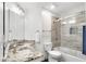 Modern bathroom with double vanity, tile accents and glass enclosed shower at 3106 Soldier Trl, Marietta, GA 30068