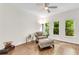 Cozy bedroom with hardwood floors, soft armchair, and bright windows offering great natural light at 3106 Soldier Trl, Marietta, GA 30068