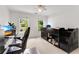Bedroom with built-in bed, ceiling fan, large window, and carpeting at 3106 Soldier Trl, Marietta, GA 30068