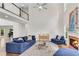 Spacious living room featuring a fireplace, soaring ceilings, and an open floor plan at 3106 Soldier Trl, Marietta, GA 30068