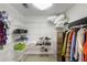 Walk-in closet with ample shelving and hanging space for organized storage at 3358 Stovehill Se Ct, Marietta, GA 30067