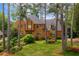Charming brick home with a well-manicured lawn and mature trees in a desirable neighborhood at 3358 Stovehill Se Ct, Marietta, GA 30067