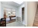 Hallway view leading to a game room with pool table and an adjacent full bathroom with a shower at 3358 Stovehill Se Ct, Marietta, GA 30067