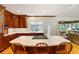 Open kitchen with an island, wooden cabinets, and seamless transition into the living area at 3358 Stovehill Se Ct, Marietta, GA 30067