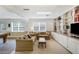 Comfortable living room offers ample seating, natural light, and built-in shelving for storage and decor at 3358 Stovehill Se Ct, Marietta, GA 30067