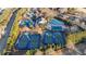 Aerial view of the community pool, tennis courts and gathering spaces at 5560 Stoneleigh Dr, Suwanee, GA 30024