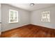 Bright and airy bedroom with hardwood floors and ample natural light from two windows at 720 Maynard Se Ter, Atlanta, GA 30316