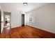 Bright bedroom features hardwood floors, a neutral color palette, closet, and natural light at 720 Maynard Se Ter, Atlanta, GA 30316