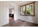Bright bonus room featuring white walls, wooden accents and trim, and hardwood floors at 720 Maynard Se Ter, Atlanta, GA 30316