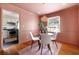 Charming dining area with a glass table and a woven light fixture, perfect for intimate meals at 720 Maynard Se Ter, Atlanta, GA 30316