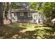 Charming home featuring green siding, double-pane windows, and a spacious yard at 720 Maynard Se Ter, Atlanta, GA 30316