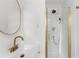 Modern bathroom featuring sleek fixtures, a glass-enclosed shower, and stylish vanity at 1755 Rockbridge Nw Rd, Conyers, GA 30012