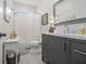 Bathroom features include a gray vanity with marble top, and tiled floors at 3025 Woodwalk Se Dr # 17, Atlanta, GA 30339