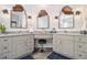 Elegant bathroom with dual sinks, custom mirrors, granite counters, and ample storage at 3025 Woodwalk Se Dr # 17, Atlanta, GA 30339