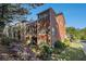 Brick exterior of homes with balconies, lots of windows, and lush landscaping at 3025 Woodwalk Se Dr # 17, Atlanta, GA 30339