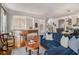 Open concept living room with hardwood floors and multiple gathering areas with a seamless flow at 3025 Woodwalk Se Dr # 17, Atlanta, GA 30339
