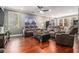 Spacious living room perfect for entertaining with a large sectional and tv at 3025 Woodwalk Se Dr # 17, Atlanta, GA 30339