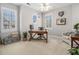 Bright room boasts white trim, neutral carpet, built in cabinets, and lots of natural light at 3025 Woodwalk Se Dr # 17, Atlanta, GA 30339