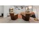Finished basement featuring a sitting area, neutral paint, built in shelves and recessed lighting at 5010 Winding Hills Ln, Woodstock, GA 30189