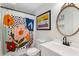 A full bathroom with modern features including a vibrant shower curtain and contemporary fixtures at 5010 Winding Hills Ln, Woodstock, GA 30189