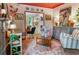 Charming living room with hardwood floors, a fireplace, eclectic art, and comfortable seating at 5010 Winding Hills Ln, Woodstock, GA 30189