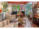 Cozy living room showcasing stylish seating, hardwood floors, and a glimpse of the staircase at 5010 Winding Hills Ln, Woodstock, GA 30189