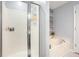 Bathroom featuring a separate shower and tub, with modern fixtures and decorative wall accents at 5174 Ridge Tarn, Acworth, GA 30102