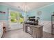 Bright home office with wainscoting, chandelier, and a view of the front yard at 5174 Ridge Tarn, Acworth, GA 30102