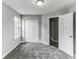 Bedroom featuring a closet with bi-fold doors, a light, and a window at 5452 Sweetsprings, Powder Springs, GA 30127