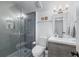 Updated bathroom featuring gray tiled shower with glass enclosure and a modern vanity at 732 S Fairfield Dr, Peachtree City, GA 30269