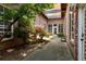Beautiful brick building courtyard with lush greenery and a skylight at 320 Martin Luther King Jr Se Dr # 15, Atlanta, GA 30312