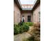 Courtyard featuring brick walls, lush greenery, landscaping, and water feature at 320 Martin Luther King Jr Se Dr # 15, Atlanta, GA 30312