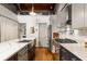 Island kitchen featuring a stainless steel farm sink, appliances, and a subway tile backsplash at 320 Martin Luther King Jr Se Dr # 15, Atlanta, GA 30312