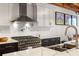 Close up on kitchen with stainless steel appliances, white subway tile backsplash, and cabinets at 320 Martin Luther King Jr Se Dr # 15, Atlanta, GA 30312
